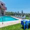 Villa Anthi, a modern villa with salted water pool,hot tub & BBQ!