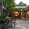 Qiuguo Hutong Courtyard Hotel