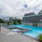 Condo climatisé près du Mont Sainte-Anne avec parc aquatique, piscine, spa, gym, arcades et billard !