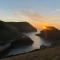 Polrunny Farm Seaberry Cottage with a sea view and log burner