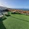 Tenerife apartment 100m2 CASA DE DON QUIJOTE with a terrace of 100m2 with a view of the ocean and Teide volcano and a garden of 600m2