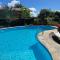 Adorable pool house in a beautiful garden