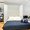 Spacious Lower ground Studio Apartment with private patio near Warren Street
