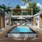 Moringa Resort with Pool, open Air Shower & shared Bath sleeps 8