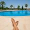 Sunny villa facing the swimming pool