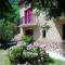 Appartement 48 m2 avec jardin au rdc dans villa à 5 min à pied des Thermes de Vernet-les-Bains, location de samedi à samedi