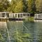 Beautiful holiday home above the water, in a holiday park in Limburg