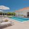 Madini Luxury villa with private heated pool