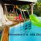 Magnifique Lodge en bois avec piscine et jardin de 800 m2
