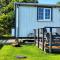 Cozy Shepherd hut 20 by 7 feet with boxed in high double bed