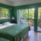 rainforest suite with a king size bed