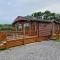 Beautiful Willow Lodge 67-4-6 persons-Private Hot Tub-Pet Friendly-Tranquil holiday away from it all yet not far to St Austell-The Holiday Home has two bedrooms, living & dining area, equipped kitchen -Decking-Al Fresco dining-Fishing lakes-Pet friendly