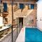 Albuqassim a modern townhouse in Pollensa, with heated pool