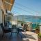 Cozy seaside penthouse with sea & mountain view.