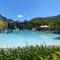 Blue on Blue Deluxe King or Twin room, steps from ferry, amazing pool, wifi