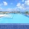 Stylish luxury condo, central location, ocean view, pool, gym