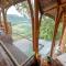 Cliffside Bamboo Treehouse with Heated Pool and View