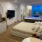 Superbe suite avec jacuzzi patio et sauna