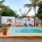 One bedroom apartement at Flic en Flac 800 m away from the beach with shared pool enclosed garden and wifi