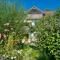 Traumhafte Gartenwohnung in Überlinger Hanglage - Zur goldenen Kiwi