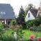 Dachgeschosswohnung Scharbeutz mit Garten