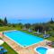 Studio Apartments Paradise with large swimming pool at Pelekas Beach