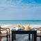 Red Parrot Beach Villa with privat swimming pool