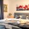 110qm Wohnung mit Garten, Grill, Kamin, Parkplatz & Kingsize Betten