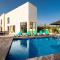 LINDA Oura Beach 4BR Villa 10 New for rent!