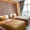 12-10 Twin bedroom in Formosa Residence Nagoya Batam 3 pax by Wiwi