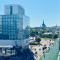 City Heart Apartment with a Sunny Rooftop Terrace