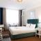 City Plaza Apartments & Rooms