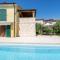 Charming Orange Apartment with Private Pool and Garden Oasis