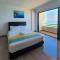 'Sunny seaview condo' at Regency by Shine Stay