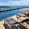 The BASE Central PATTAYA Long Balcony with Infinity Pool & Free Netflix