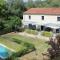 2 bedroom home with shared pool in lovely market town of Olonzac in wine region