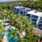 The Oasis Apartments and Treetop Houses