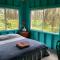 Simple Rustic studio deluxe bed in tropical fruits garden