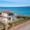 La Conia Beach Loft: Appartamento di Lusso con Terrazza sul Mare, Terrazza sul Mare