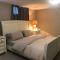 Licensed spacious basement suite with two king size beds