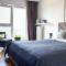 Capital Towers - Apartament Red z widokiem na panoramę miasta i rzekę