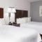 Hampton Inn & Suites Orlando Airport at Gateway Village - Queen Room With Two Queen Beds - Niet Roken