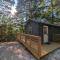 Log Cabin #2 with hot tub deck and sunset view at Loblolly Pines