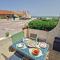 Petite maison à la plage dans résidence naturiste