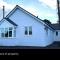 White 3 bed bungalow with en-suite and parking