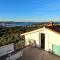 House among olive trees with a sea view 1