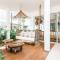 Charming Boho entire condo w Patio Swing
