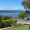 Relax in the spa with views opposite Lake Eildon