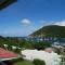 duplex, 2 bedrooms, 2 couples sea view overlooking the village of DESHAIES