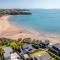 Clifftop Coastal Retreat with Ocean Views - Close to Beach & Cafés